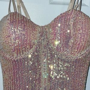 Banjul sequin dress, size medium. Color is cream with hints of purply pink